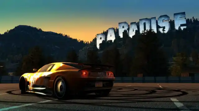 A car standing on a parking lot with "Paradise" sign in the background.