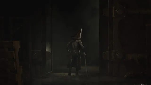 Pyramid Head leaving the S Room after the boss fight in Bluecreek Apartments