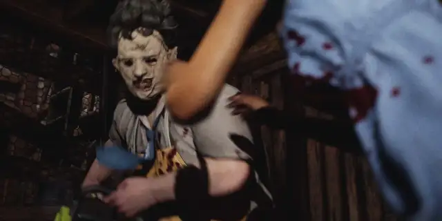 Leatherface about to kill Ana with his chainsaw