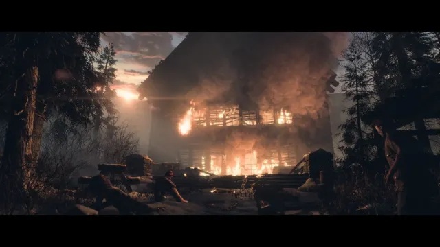 The cabin on fire as all surviving members sits around it in the best ending for Until Dawn