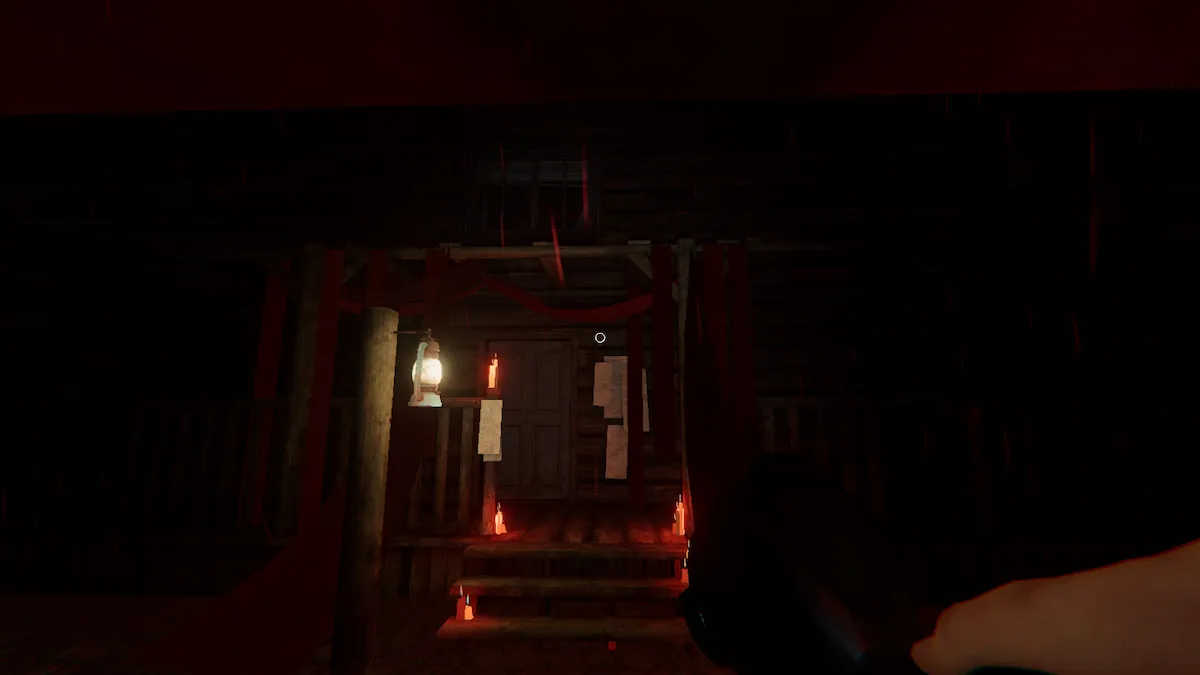 The front porch of Grafton Farmhouse covered in red light from the blood moon in Phasmophobia.