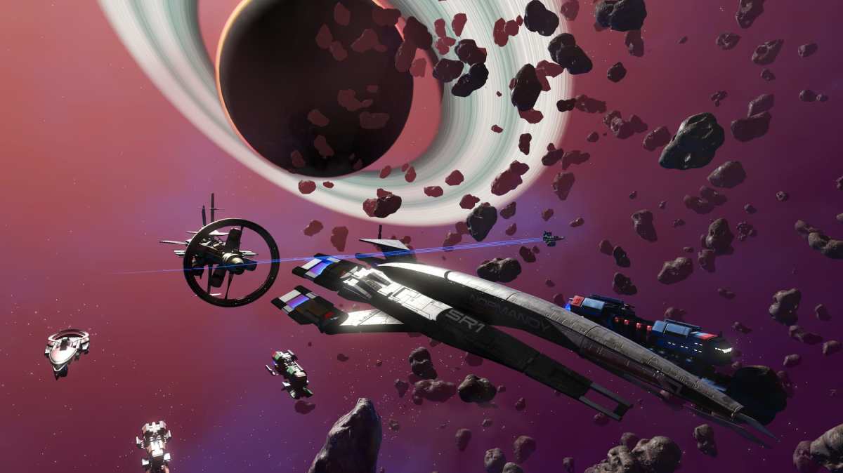 The Normandy, a ship from Mass Effect, sits against a purple space sky with a ringed planet in the background.