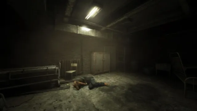 An establishing shot of Mount Massive basement with a single patient in fetal position on the floor