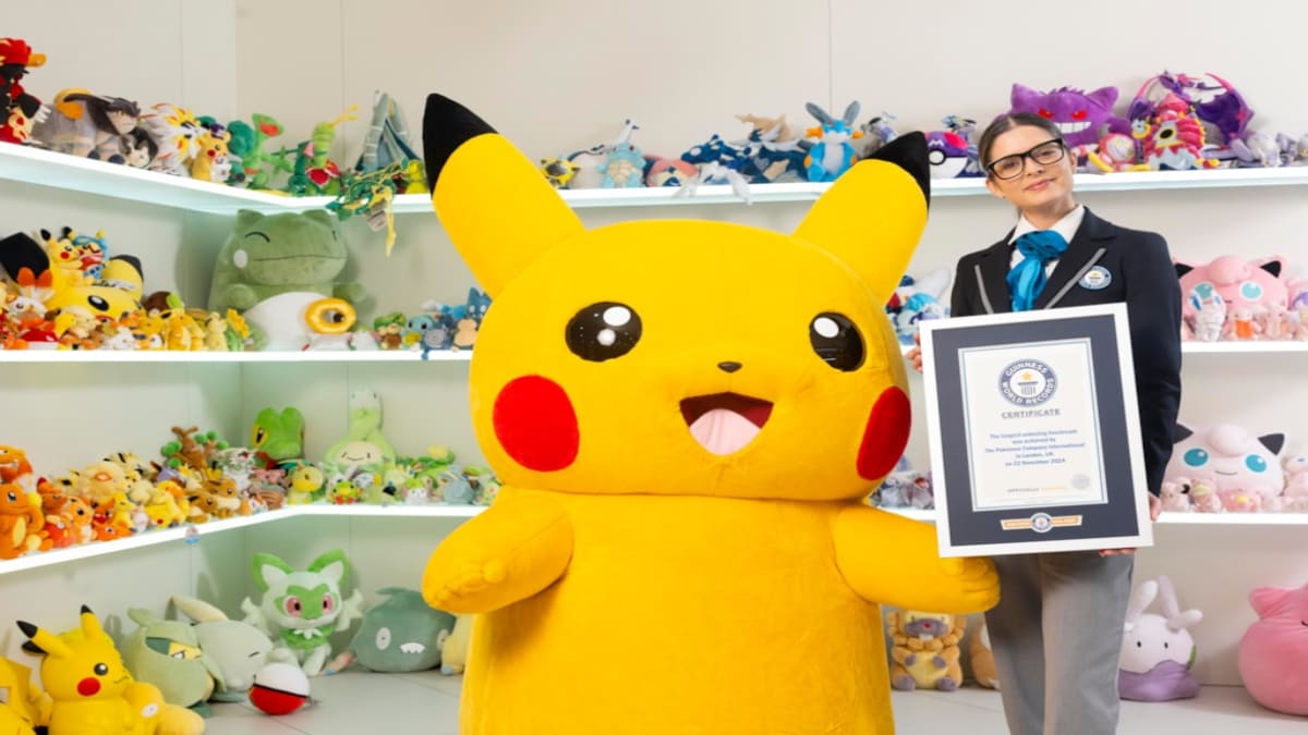 Pikachu collecting a Guinness World Record certificate.