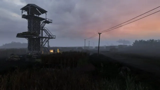 An establishing shot of a watchtower with powerlines on the street next to it as dusk falls.