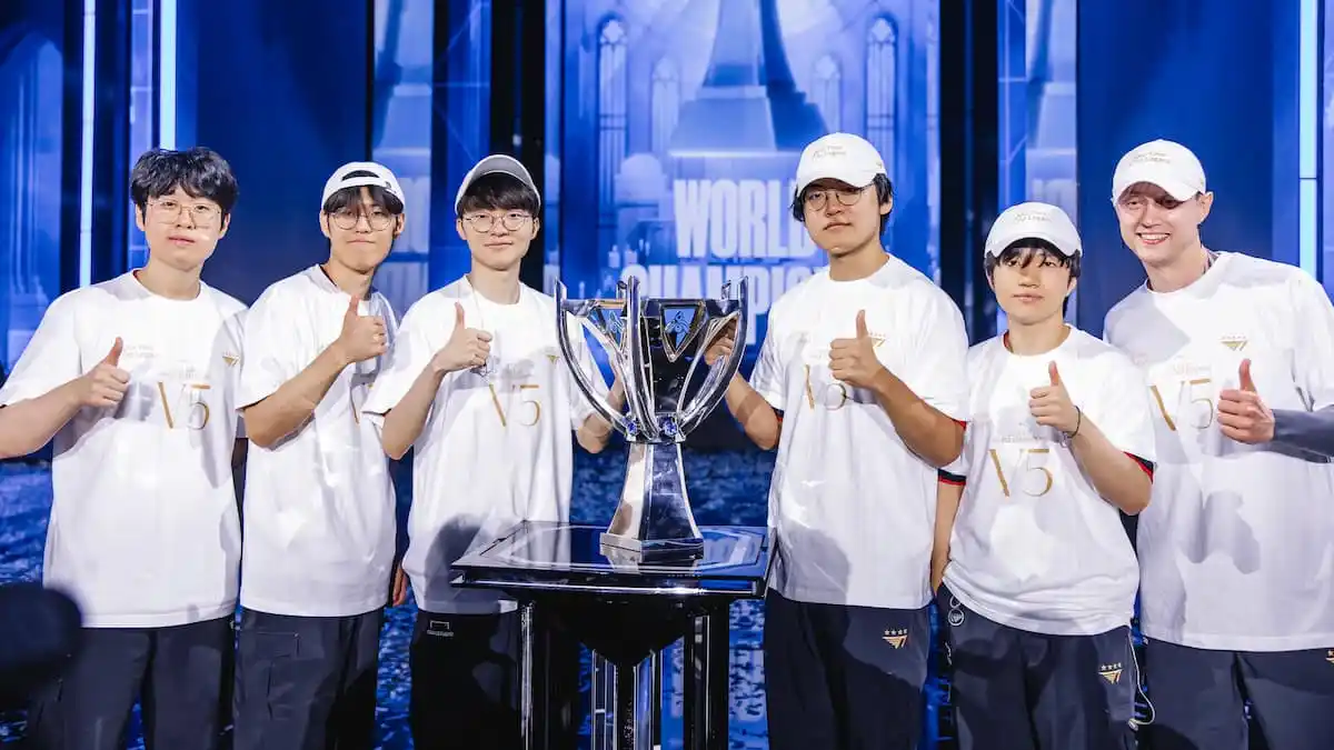 T1 lift the trophy onstage after victory at the League of Legends World Championship 2024 Finals on Novemeber 02, 2024 in London.