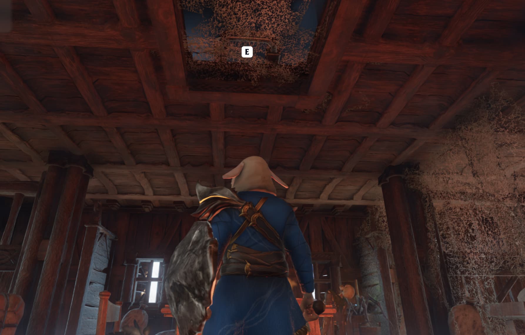 The player character from Enshrouded looks up at a Grapple Hook point in the wooden ceiling of a house.