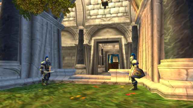 Two guards stand watch in Stormwind City, WoW Classic