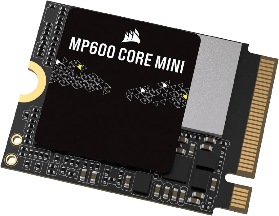 Front view of the Corsair MP600 Mini 1TB, a mostly black M.2 2300 SSD drive imprinted with the Corsair logo and the text "MP600 Core Mini". More details below.