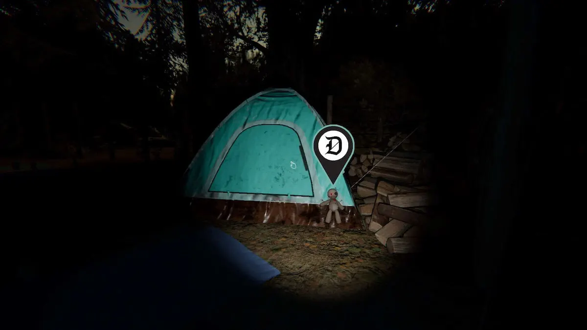 A Voodoo Doll leaning up against a turquoise tent at Camp Woodwind in Phasmophobia.