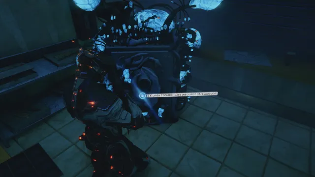 A Warframe is in front of a Techrot Safe, which looks like a contemporary safe covered by the Infestation.