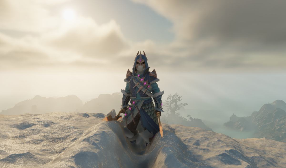 A screenshot of a character from Enshrouded standing atop a high alpine peak with a beautiful sky horizon wearing blue and silver gear.