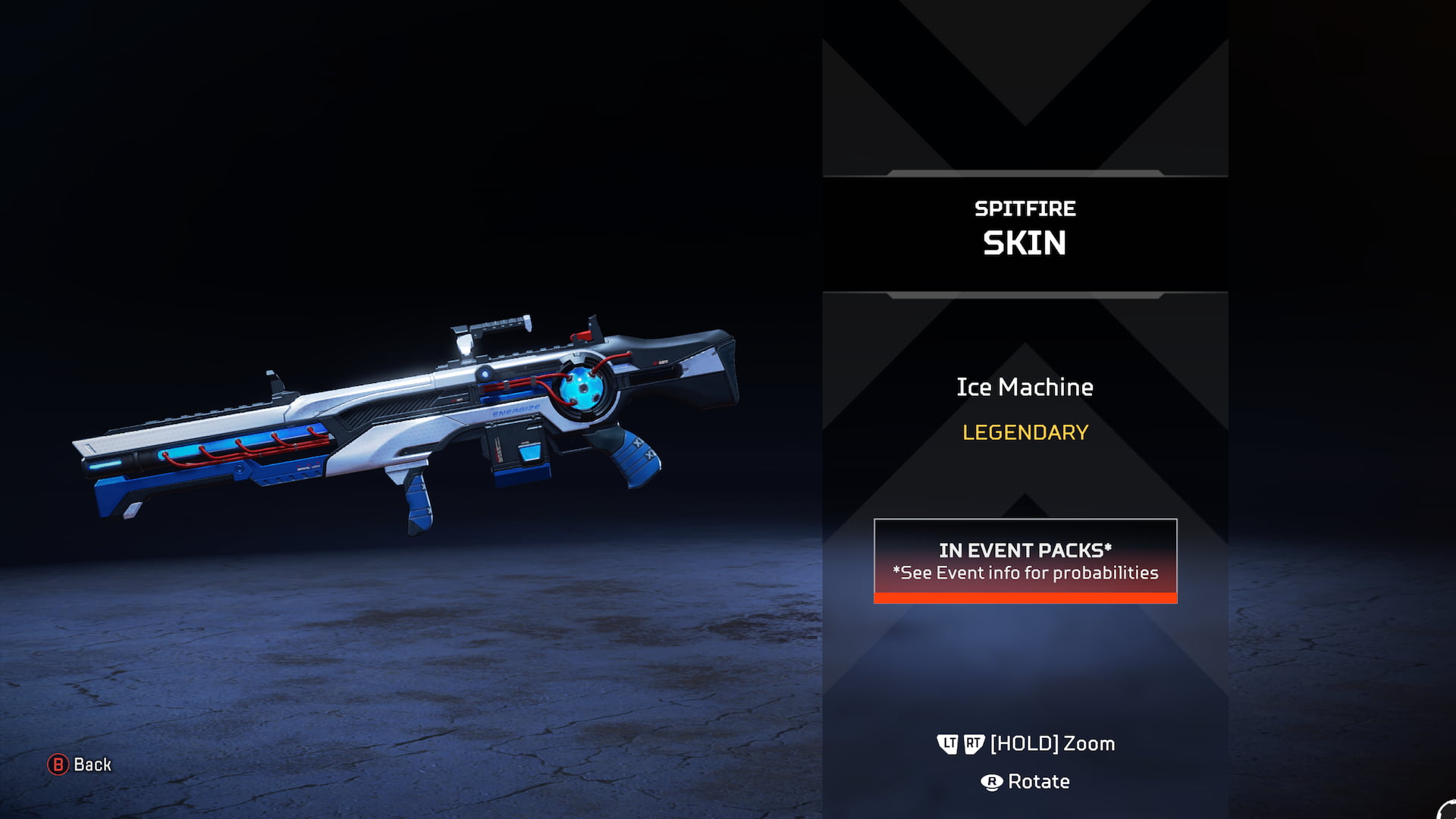 A large white Spitfire LMG skin with a glowing blue orb near the magazine.