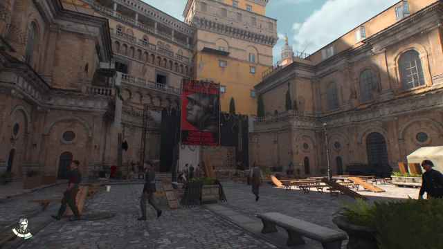 A courtyard in Indiana Jones and the Great Circle with a Mussolini poster.