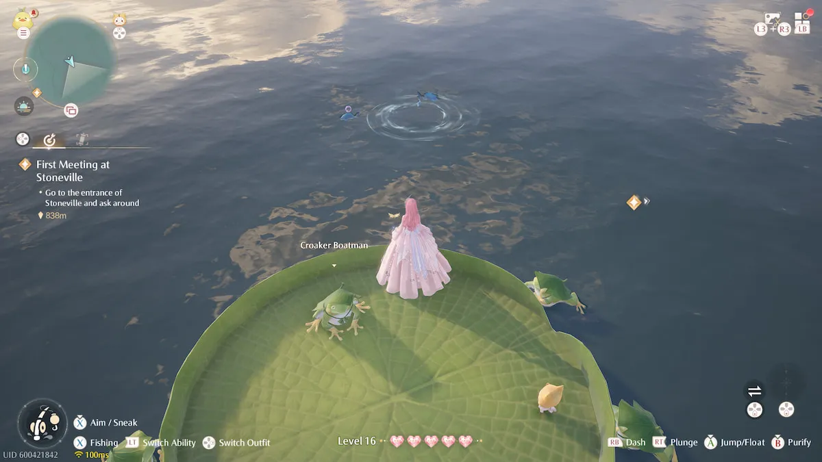 nikki in a pink ballgown standing on a lily pad boat, watching for pink bubbles in the water