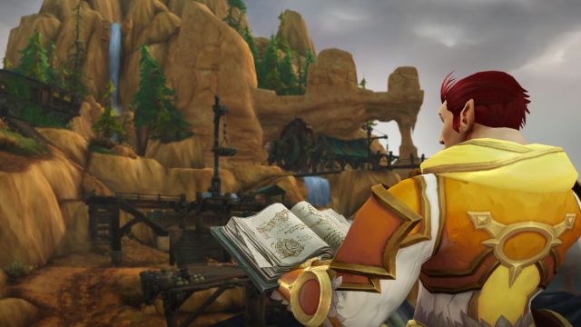 Character reading a book in front of the Siren Isle new zone in World of Warcraft.