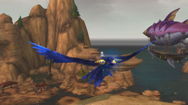 Player character on a purple phoenix mount flying about the Siren Isle in World of Warcraft with an airship behind them.