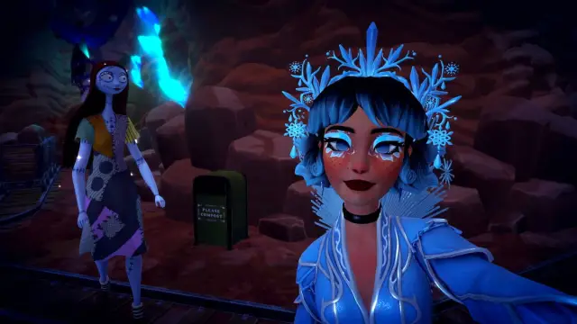 A player with an icy blue crown taking a picture with Sally and a green compost bin in Disney Dreamlight Valley.