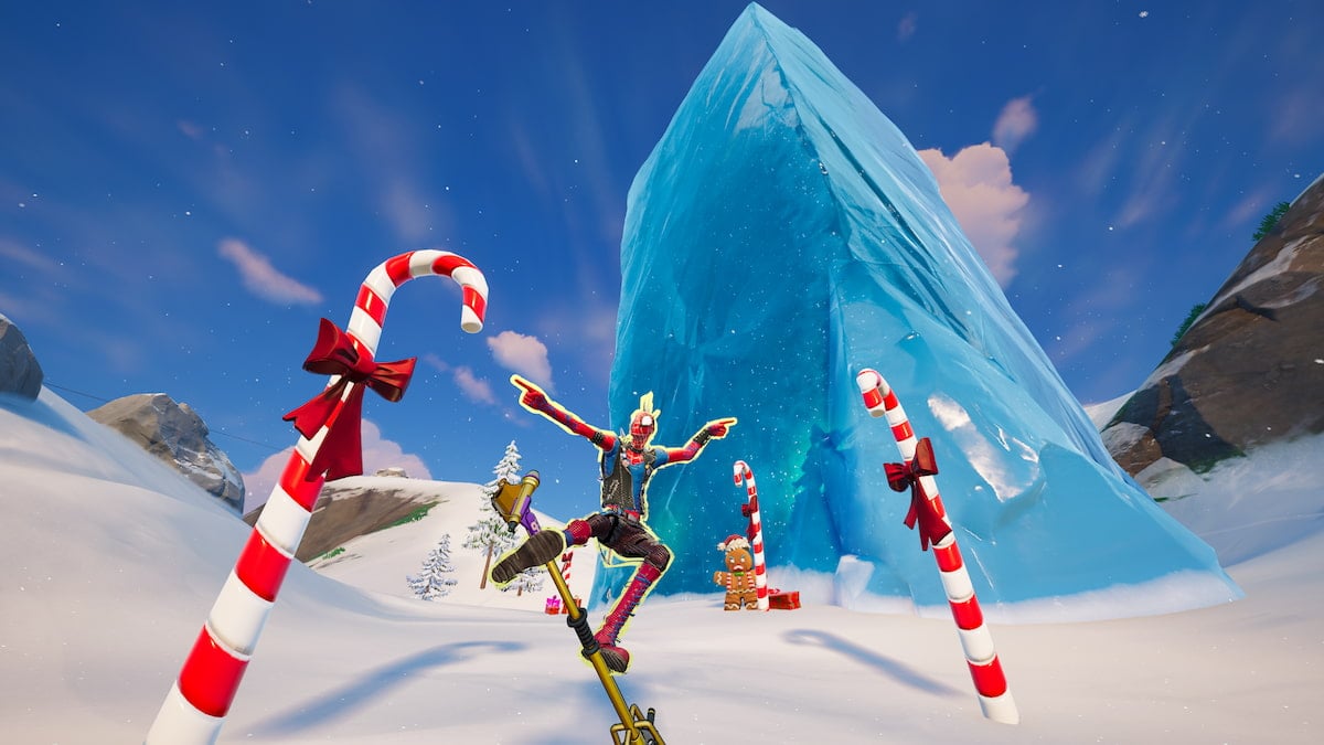 Spider-Punk standing on a microphone between two candy canes in front of a giant block of ice that has Mariah Carey frozen inside in Fortnite.