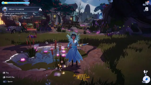 A player in an icy blue outfit with wings standing holding a shovel by a sparkling worm digging spot in Disney Dreamlight Valley.