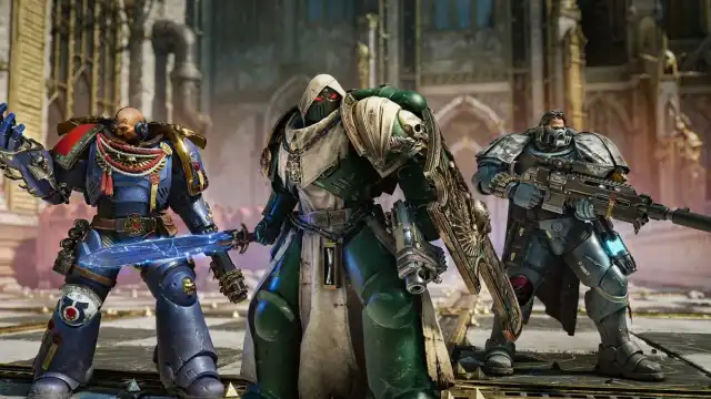 Warhammer 40k Space Marine 2 three co-op characters standing together in loading screen