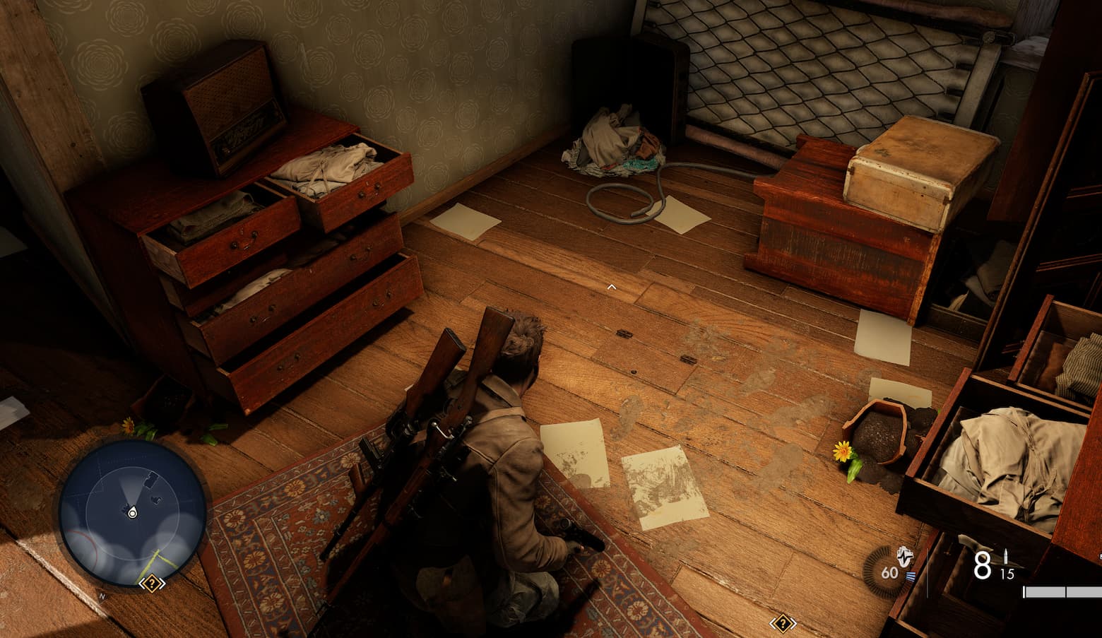 The main character of Sniper Elite Resistance stands atop a wooden floor. One of the planks has a set of hinges on it.