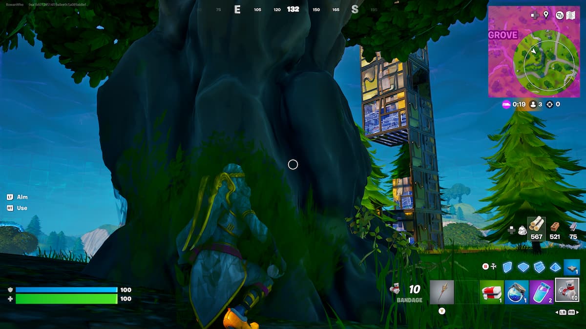 stoneheart in a bush by a tree in fortnite