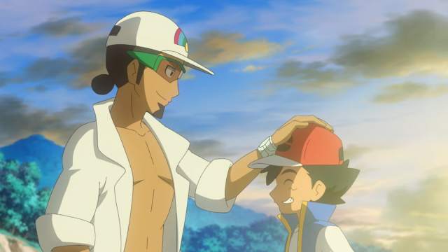 Kukui with his hand on Ash's head.