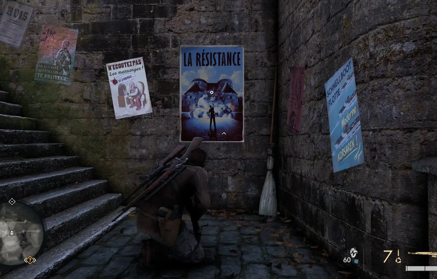 Harry, the main character in Sniper Elite Resistance crouches on a stone stair case. A blue poster with the words "La Résistance" stretching across it hangs from a stone wall.