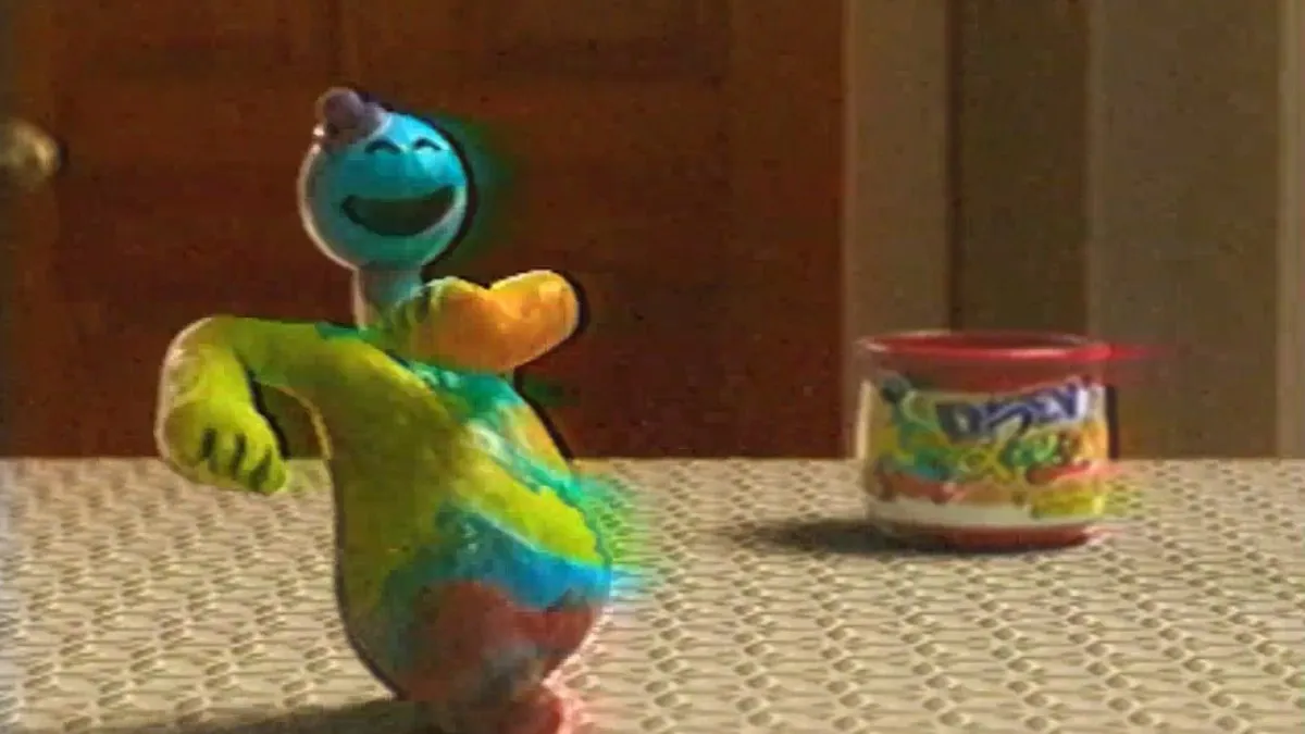 Doey strolling past his Play-Doh pot in the background for his commercial at the start of Poppy Playtime chapter 4