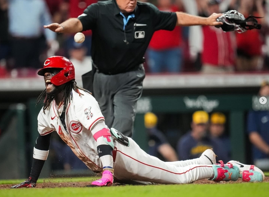 Elly De La Cruz sliding into home