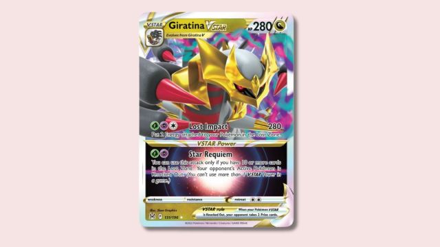 Giratina VSTAR Pokémon card on a pink background.