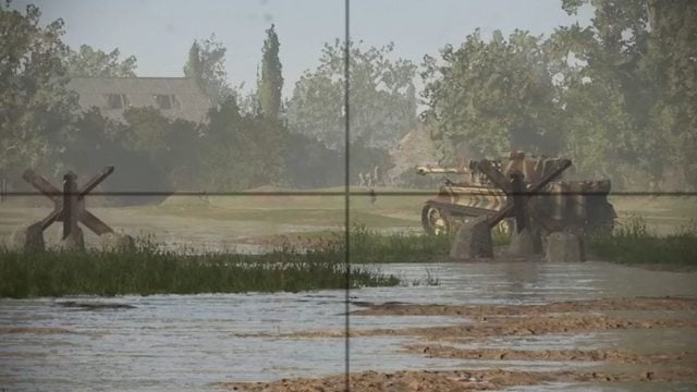 Sniper scope aiming at an infantry soldier on other side of ditch between trees