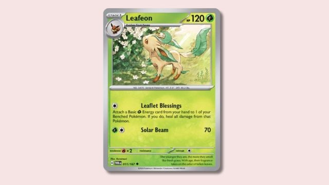 Leafeon Pokémon card on a pink background.