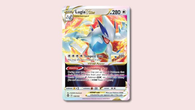 Lugia VSTAR Pokémon card on a pink background.