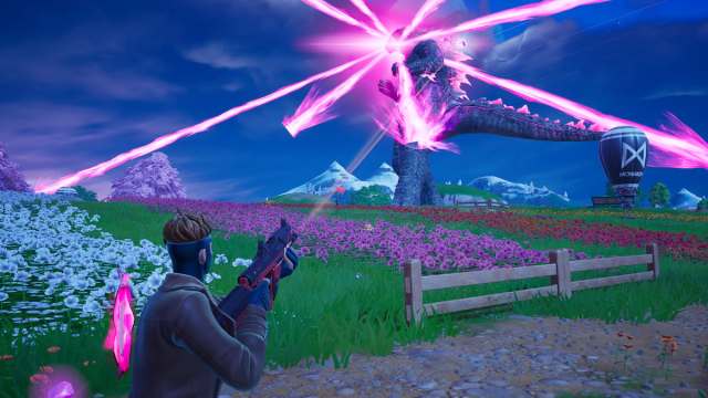 Gambit shooting at Godzilla in a flower field in Fortnite.