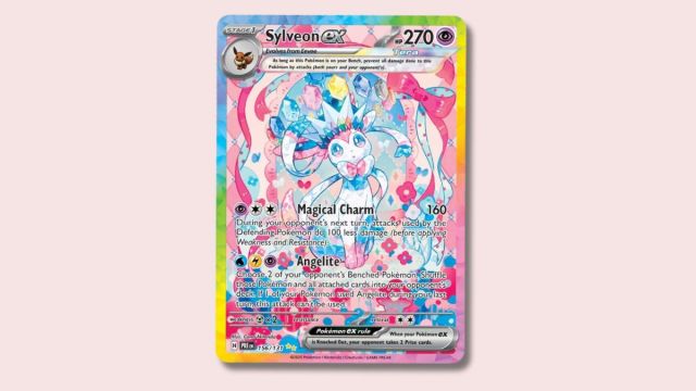 Sylveon Pokémon card on a pink background.