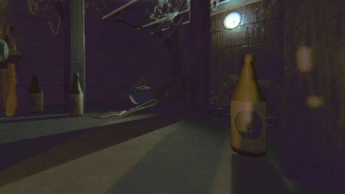 Crouched inside the Service Station attic, looking at the skeletal remains with cobwebs above the skeleton