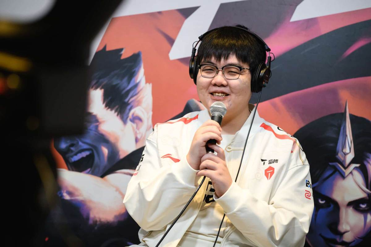 369 of Top Esports, wearing a white jacket, speaks on a microphone during The First Stand Tournament 2025 Asset Day.