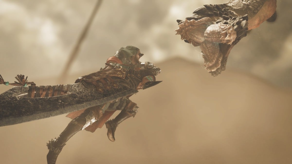 Monster Hunter Wilds player charging at a monster with his sword