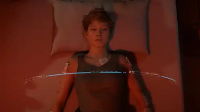 The actress Lea Seydoux in Death Stranding 2 lying on a bed with a hologram passing around her.