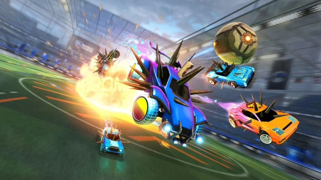 Screenshot of five Rocket League cars covered in spikes being hurled from an explosion.