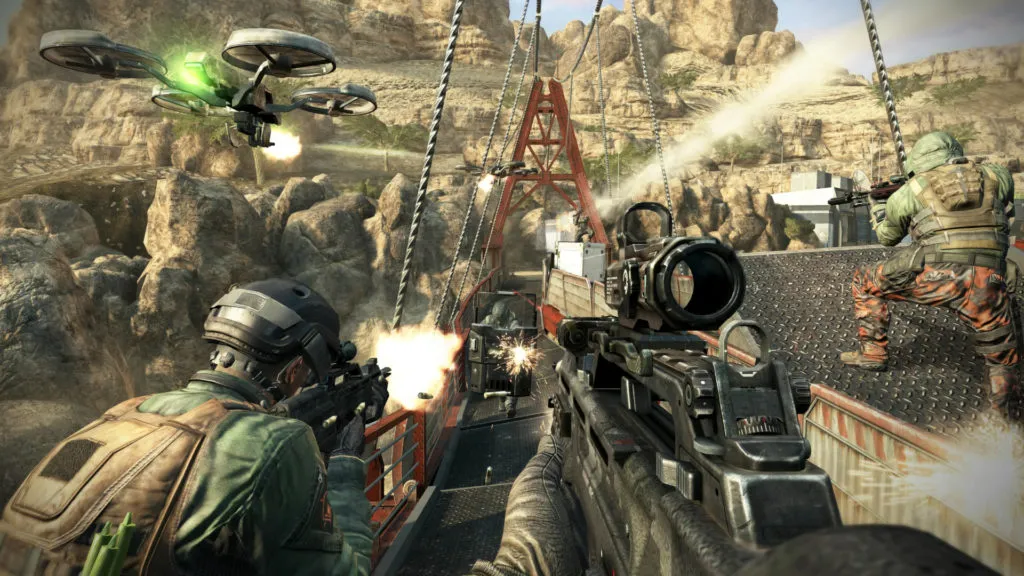 firs person in-game view of Call of Duty: Black Ops II while with a team and taking fire on a bridge