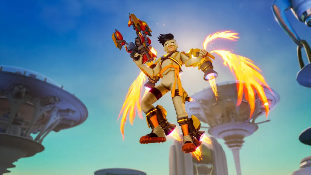A character with golden wings and rocket boots hovers in mid air while holding a weapon in Rocket Arena.
