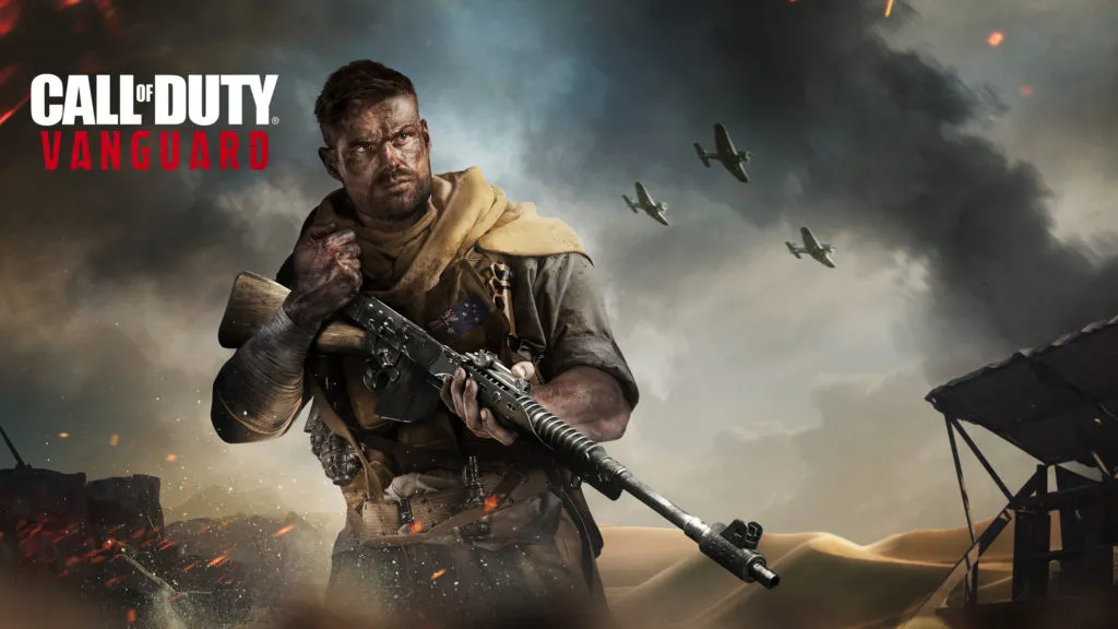 Key art for Call of Duty: Vanguard, with a soldier reloading a weapon while planes fly in the background over sand dunes.