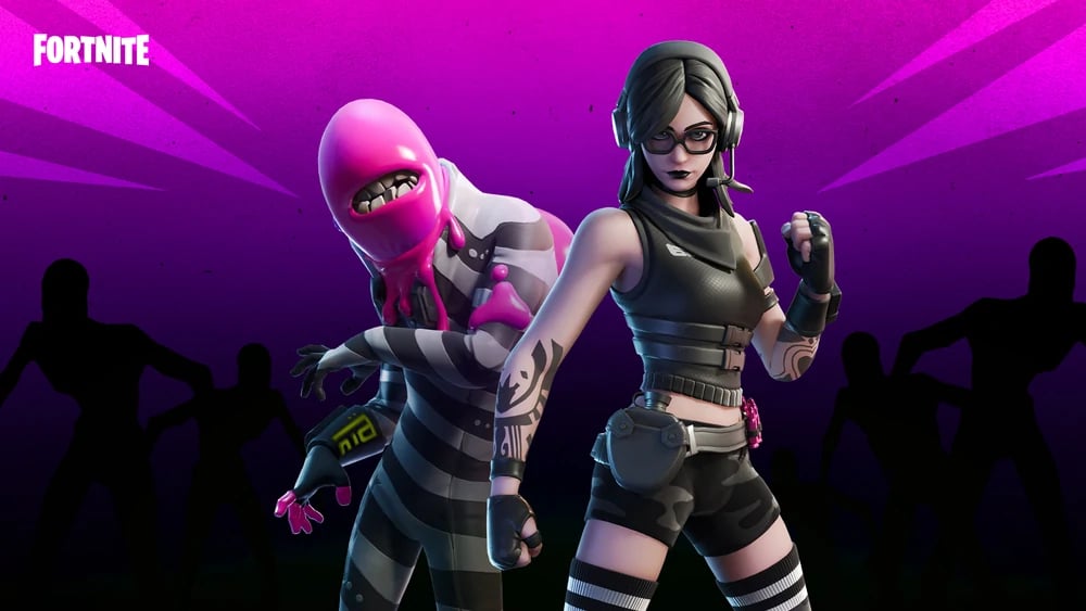 A pink blob with teeth in a prison jumpsuit and a woman with a headset in dark camo and black