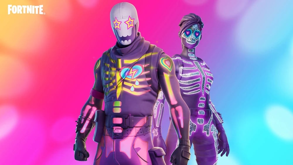 Fortnite's Sparkle Skull and Party Trooper skins which feature dark colored skin tight suits with neon like drawings of bones over them as well as hearts and stars over there eyes