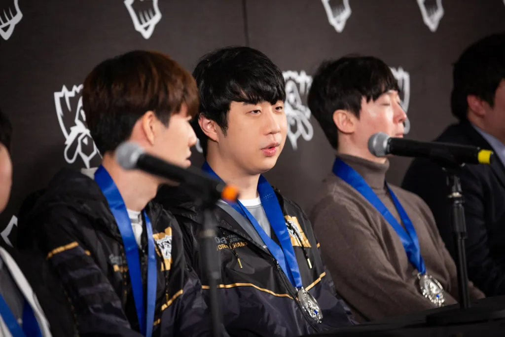 Duke, a League of Legends player, sits at a press conference at Worlds.
